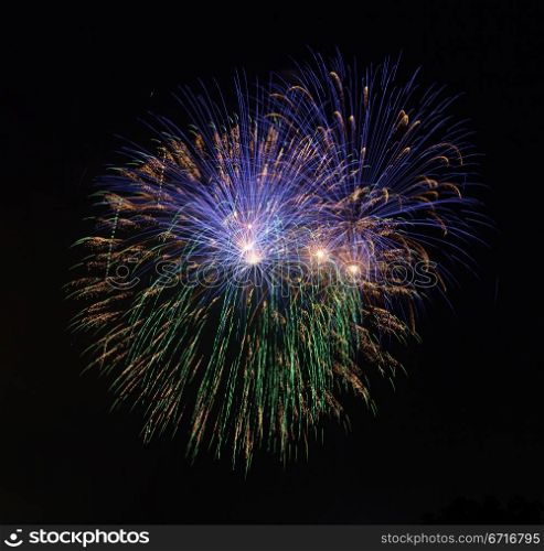Fireworks in a dark sky separated from city and ready to isolate for use in other images