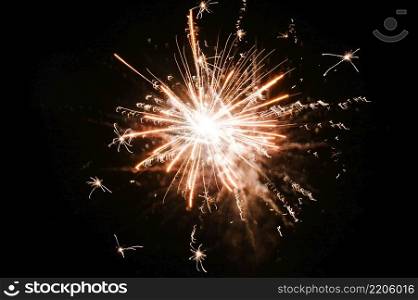 Fireworks in Happy New Year 2020. Holiday festival celebration. Fireworks display on dark sky background.