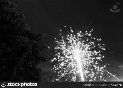 Fireworks light up the night sky on New Years Eve in Guatemala in stunning black and white