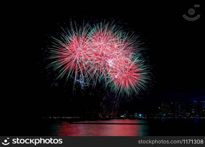 Fireworks on sea with the colorful at night.