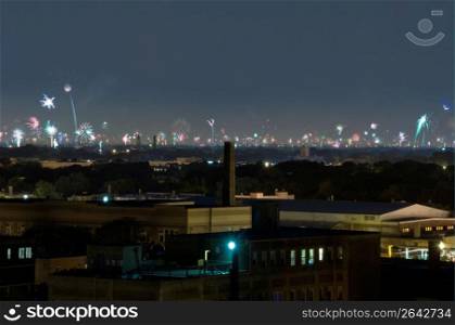 Fireworks over dark city