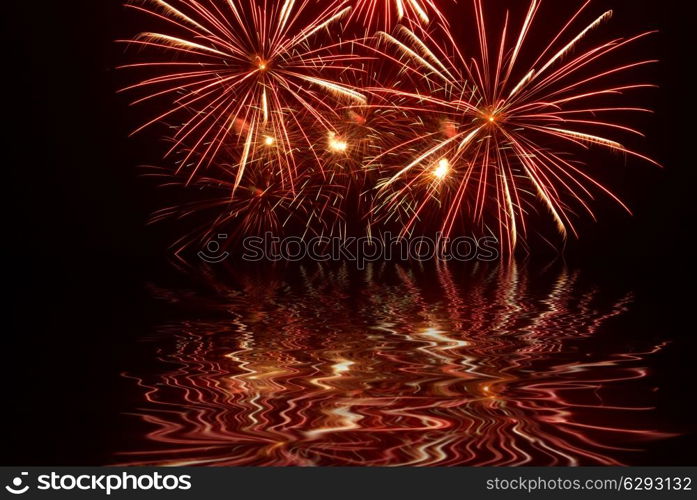 Fireworks, salute on the black sky background