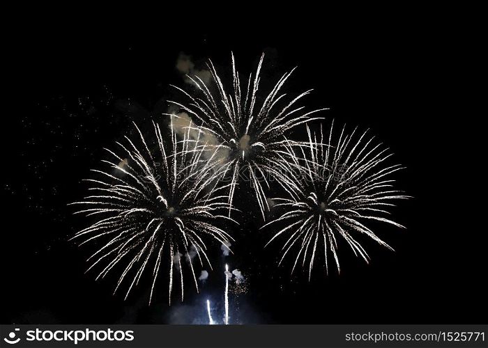 Fireworks with a dark black background, Bright beautiful colorful firework. Festive concept.