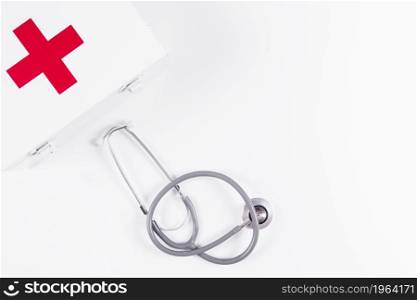 first aid kit with stethoscope white background. High resolution photo. first aid kit with stethoscope white background. High quality photo