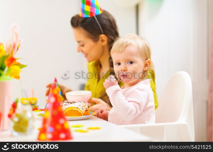 First birthday celebration party with mother and baby