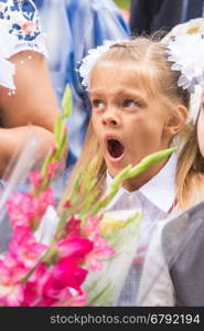 First grader yawning on line the first of September