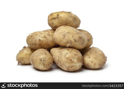 First new potatoes on white background