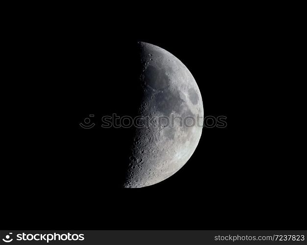 First quarter moon seen with an astronomical telescope. First quarter moon seen with telescope