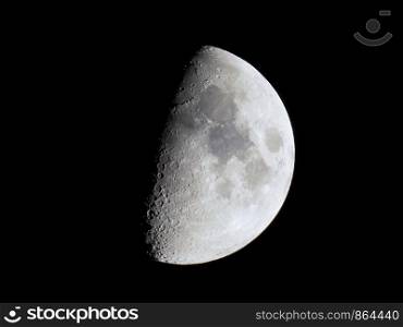 First quarter moon seen with an astronomical telescope, high resolution. First quarter moon seen with telescope