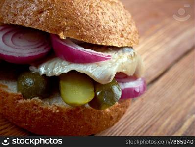 Fischbrotchen - sandwich made with fish and onions.eaten in Northern Germany. preparation bismarck herring or soused herring