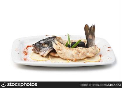fish baked in pastry with olives isolated on white background