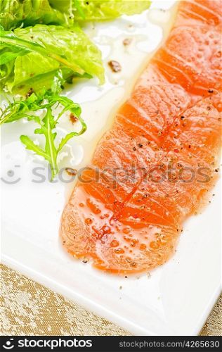 Fish Carpaccio with salad