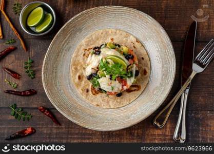 Fish ceviche toast on porcelain plate on wooden table. Spanish name tostada ceviche de pescado