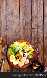 Fish cutlets with broccoli and other vegetables. Fish cutlets in sesame seeds with broccoli and vegetables