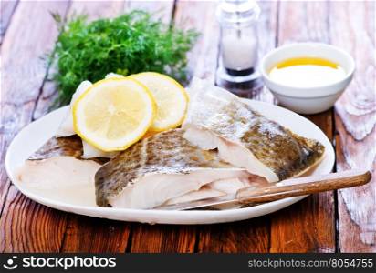 fish fillet with lemon on the plate