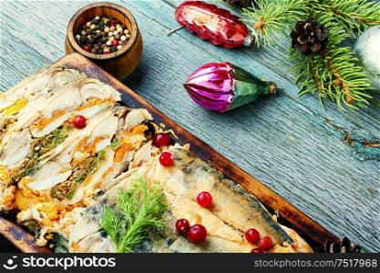 Fish roll.Fish stuffed with vegetables.Banquet dish or Christmas food. Fish roll with vegetables