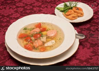 Fish salmon soup. Fish salmon soup in white plate