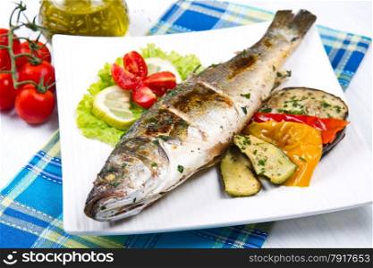 fish, sea bass grilled with lemon and grilled vegetables