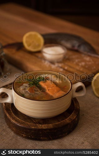 fish soup composition. Tasty fish soup - ukha, soup from different fishes and vegetables