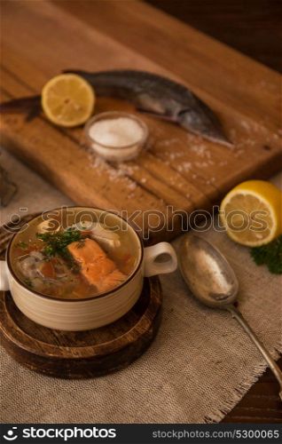 fish soup composition. Tasty fish soup - ukha, soup from different fishes and vegetables