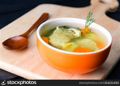 Fish soup served on the table in plate