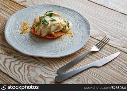 Fish with mayonnaise and parsley on crunchy tortilla molecurar gastronomy