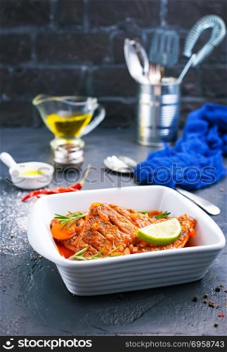fish with tomato sauce . fish with tomato sauce and aroma spices, stock photo