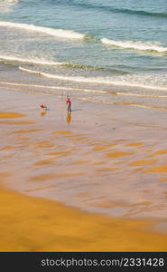 Fisherman angler with fishing rod on sea shore.. Angler with fishing rod on sea shore