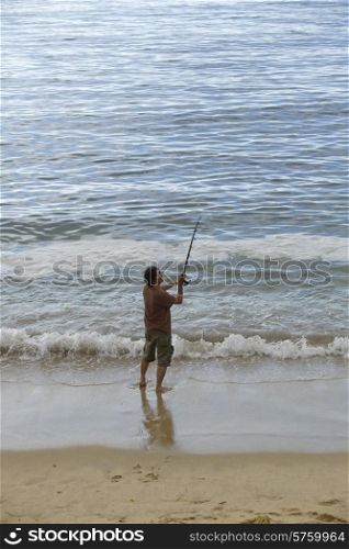 fisherman at the sea, in the north of spain