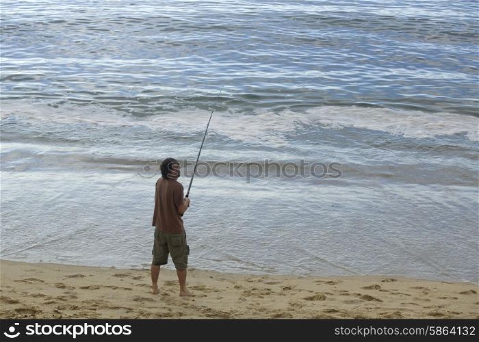 fisherman at the sea, in the north of spain