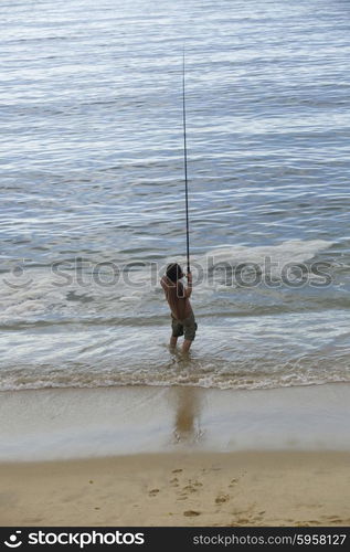 fisherman at the sea, in the north of spain