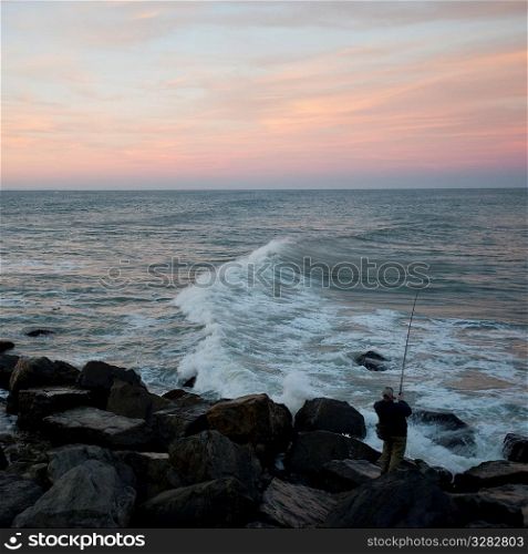 Fisherman on the Hamptons seashore