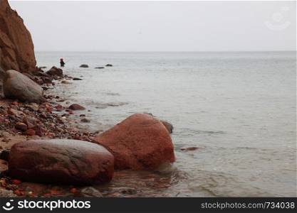Fisherman Stones in sea water autumn sea in Orlowo, Gdynia Poland