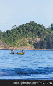 Fishermen catch fish in the morning.