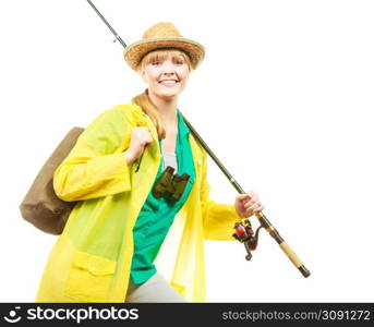 Fishery, spinning equipment, angling sport and activity concept. Woman wearing raincoat holding fishing rod, ready for adventure.. Woman with fishing rod, spinning equipment