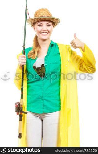 Fishery, spinning equipment, angling sport and activity concept. Woman with fishing rod showing thumb up gesture. Woman with fishing rod, spinning equipment