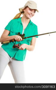 Fishery, spinning equipment, angling sport and activity concept. Happy smiling woman with fishing rod.. Woman with fishing rod, spinning equipment