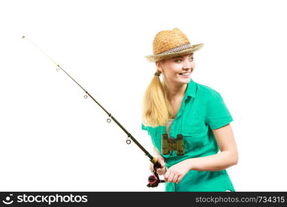 Fishery, spinning equipment, angling sport and activity concept. Happy smiling woman with fishing rod.. Woman with fishing rod, spinning equipment