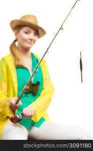Fishery, spinning equipment, angling sport and activity concept. Woman with fishing rod.. Woman with fishing rod , spinning equipment