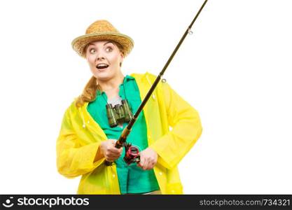 Fishery, spinning equipment, angling sport and activity concept. Woman with fishing rod.. Woman with fishing rod, spinning equipment
