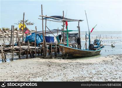 Fishing boat at low tide in the south of Thailand