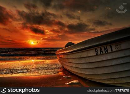 Fishing boat at sunrise in the seaside resort of Bansin on the island of Usedom