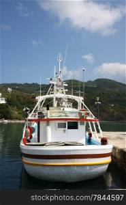 Fishing boat in Greek port Skopelos on Skopelos island