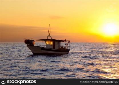 fishing boat in sunrise at Mediterranean sea traditional fishery