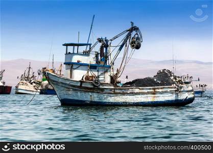 fishing boat in the bay of the Pacific Ocean