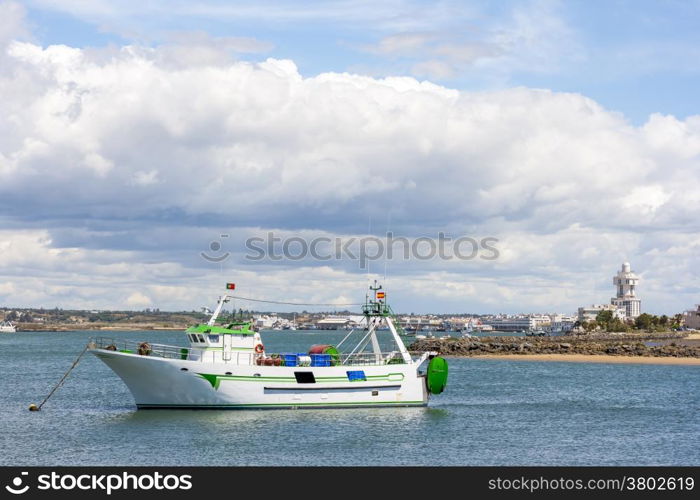 Fishing-boat in the Guadiana River between spain and portugal