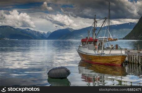 fishing boat in the harbor of Vik at the sognefjord in Norway