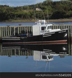 Fishing boat moored at dock, Mabou, Cape Breton Island, Nova Scotia, Canada