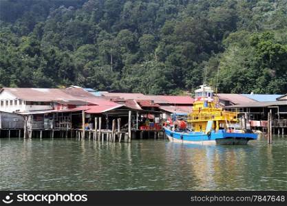 Fishing boat near village on the Pangkor island, Malaysia