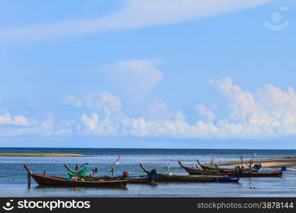 Fishing boat on the beach in summer